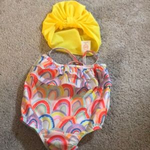 swimming costume with hat